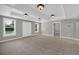 Bonus room includes neutral carpet, trey ceiling, recessed lights and a closet at 3641 Carriage Glen Way, Dacula, GA 30019