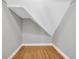 This closet features hardwood floors and white trim at 3641 Carriage Glen Way, Dacula, GA 30019