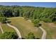 Scenic view of a community park with walking trails and soccer fields, ideal for outdoor activities at 3641 Carriage Glen Way, Dacula, GA 30019