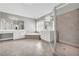 Large main bathroom featuring tiled floors, double vanity, soaking tub, and glass enclosed shower at 3641 Carriage Glen Way, Dacula, GA 30019