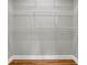 Empty walk-in closet boasts multiple wire shelves and hardwood floors at 3641 Carriage Glen Way, Dacula, GA 30019