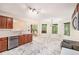 Bright kitchen with stainless steel appliances, white counters, and an adjacent dining area at 4795 Wilkins Station Dr, Decatur, GA 30035