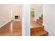 Bright living room featuring hardwood floors, fireplace, and access to the deck at 4795 Wilkins Station Dr, Decatur, GA 30035