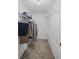Walk-in closet with ample shelving and clothing racks at 1465 Laleiah Dr, Cumming, GA 30041