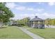 Picturesque lakeside gazebo offering serene views and a relaxing community gathering space at 1465 Laleiah Dr, Cumming, GA 30041