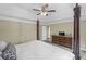 Main bedroom suite showcasing a four poster bed with plenty of storage space at 1465 Laleiah Dr, Cumming, GA 30041
