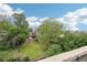Spacious backyard featuring a lush lawn and mature trees, offering a private outdoor oasis at 640 Glen Iris Ne Dr # 609, Atlanta, GA 30308