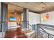 Upstairs bedroom with hardwood floors, industrial ceiling, and stylish lighting fixtures at 640 Glen Iris Ne Dr # 609, Atlanta, GA 30308
