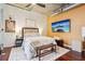 Well-lit bedroom with hardwood floors, ceiling fan, and modern decor at 640 Glen Iris Ne Dr # 609, Atlanta, GA 30308