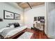 Cozy bedroom with hardwood floors, and modern decor, and desk workspace at 640 Glen Iris Ne Dr # 609, Atlanta, GA 30308