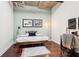 Cozy bedroom with hardwood floors, a neutral color palette, and ample natural light at 640 Glen Iris Ne Dr # 609, Atlanta, GA 30308