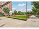 Community green space with seating and mature trees offers a relaxing retreat at 640 Glen Iris Ne Dr # 609, Atlanta, GA 30308