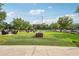 Lush green common area provides a relaxing outdoor space with seating and decorative lighting at 640 Glen Iris Ne Dr # 609, Atlanta, GA 30308