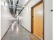 Hallway to unit featuring industrial design with exposed ductwork and concrete floor at 640 Glen Iris Ne Dr # 609, Atlanta, GA 30308