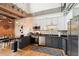 Open-concept kitchen area featuring stainless steel appliances, modern cabinetry, granite countertops, and hardwood floors at 640 Glen Iris Ne Dr # 609, Atlanta, GA 30308
