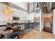 Bright kitchen featuring stainless steel appliances, modern cabinetry, granite countertops, and light hardwood floors at 640 Glen Iris Ne Dr # 609, Atlanta, GA 30308
