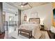 Spacious bedroom features hardwood floors, contemporary decor, and natural light at 640 Glen Iris Ne Dr # 609, Atlanta, GA 30308