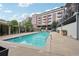 Enjoy a refreshing swim in the community pool surrounded by modern buildings at 640 Glen Iris Ne Dr # 609, Atlanta, GA 30308