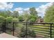 Breathtaking views from the balcony overlooking lush green scenery and neighboring homes at 640 Glen Iris Ne Dr # 609, Atlanta, GA 30308