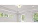 Spacious bedroom with recessed lighting and large windows at 6944 Melody Ridge Rd, Buford, GA 30518