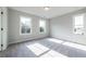 Bright bedroom with neutral carpet and multiple windows, creating a serene and inviting space at 4810 Floydwood Ln, Mableton, GA 30126