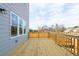 Wide-angle view of wood deck overlooking expansive yard with homes in the distance at 4810 Floydwood Ln, Mableton, GA 30126