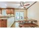 Cozy eat-in kitchen with wood floors, traditional cabinets, and sliding glass doors to the outside at 7310 Ne Wynhill Ne Dr, Atlanta, GA 30328