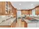 Spacious kitchen with granite countertops, stainless steel appliances, and ample cabinet space at 7310 Ne Wynhill Ne Dr, Atlanta, GA 30328