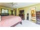 Comfortable main bedroom with an en-suite bathroom, closet, and carpet floors at 7310 Ne Wynhill Ne Dr, Atlanta, GA 30328
