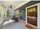 Charming covered front porch with rocking chairs and craftsman details at 2407 Boulder Se Rd, Atlanta, GA 30316
