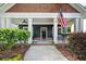 Inviting front porch with classic columns and cozy seating area at 2407 Boulder Se Rd, Atlanta, GA 30316