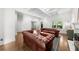 This cozy living room has coffered ceilings, hardwood floors, fireplace, and two sofas at 2407 Boulder Se Rd, Atlanta, GA 30316