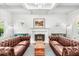 Bright living room with a fireplace and symmetrical furniture arrangement at 2407 Boulder Se Rd, Atlanta, GA 30316