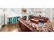 Cozy living room with fireplace and view into the dining area at 2407 Boulder Se Rd, Atlanta, GA 30316