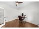Bright home office with hardwood floors, ceiling fan, and natural light from the large windows at 2407 Boulder Se Rd, Atlanta, GA 30316