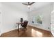 Bright home office with hardwood floors, ceiling fan, and natural light from the large windows at 2407 Boulder Se Rd, Atlanta, GA 30316