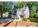Beautiful two-story home with a two-car garage, manicured landscaping, and a lovely front porch at 3253 Strathmore Dr, Duluth, GA 30096