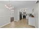 Well-lit kitchen with stainless steel appliances, modern fixtures, and tile flooring at 3253 Strathmore Dr, Duluth, GA 30096