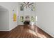 Bright, airy living room with a soaring ceiling, large windows, hardwood floors, and a cozy fireplace at 3253 Strathmore Dr, Duluth, GA 30096