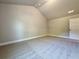 Large carpeted bedroom with neutral color palette and good natural light at 3132 Rosebud Rd, Loganville, GA 30052