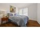 Bright bedroom with hardwood floors, a comfortable bed, and stylish decorations at 3566 Orchard Dr, Decatur, GA 30032