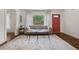 Inviting living room featuring hardwood floors, a cozy grey sofa, and stylish décor at 3566 Orchard Dr, Decatur, GA 30032