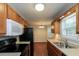 Functional kitchen with ample cabinet space, modern appliances, and updated countertops at 39 Spring Leaf Pl, Dallas, GA 30157