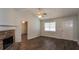 Bright living room with hardwood floors, fireplace, and a view of other rooms at 39 Spring Leaf Pl, Dallas, GA 30157