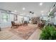 Finished basement with a ceiling fan, rug, decor, and window at 4807 Kenilworth Dr, Stone Mountain, GA 30083