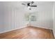 Bright bedroom with hardwood floors, ceiling fan and natural light at 4807 Kenilworth Dr, Stone Mountain, GA 30083