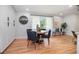 Cozy breakfast nook with modern decor, hardwood floors, and natural light from the window at 4807 Kenilworth Dr, Stone Mountain, GA 30083
