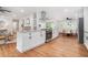 Bright, modern kitchen features granite countertops, white cabinets, and stainless steel appliances at 4807 Kenilworth Dr, Stone Mountain, GA 30083