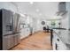 Updated kitchen with stainless steel appliances, granite countertops, and a breakfast area at 4807 Kenilworth Dr, Stone Mountain, GA 30083