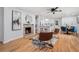 Open living space with a fireplace and seamless transition to kitchen and dining area at 4807 Kenilworth Dr, Stone Mountain, GA 30083